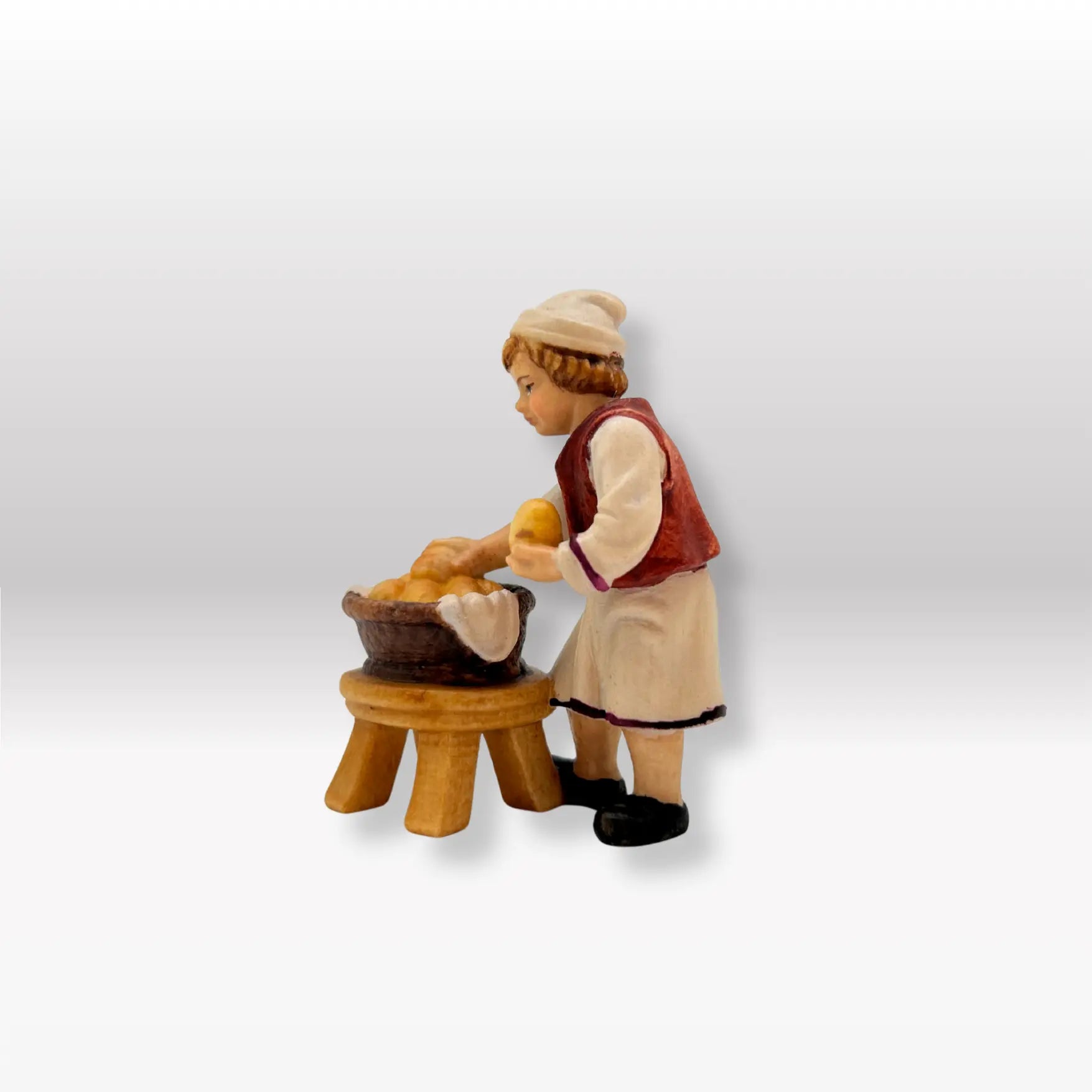 Bub mit Brotkorb von Kostner